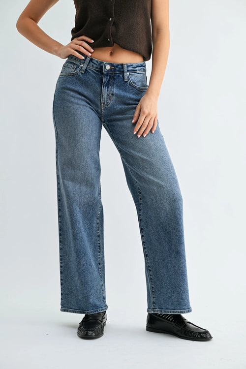 High-waisted blue denim jeans with straight-leg cut and five-pocket design featuring low rise mid wash fabric