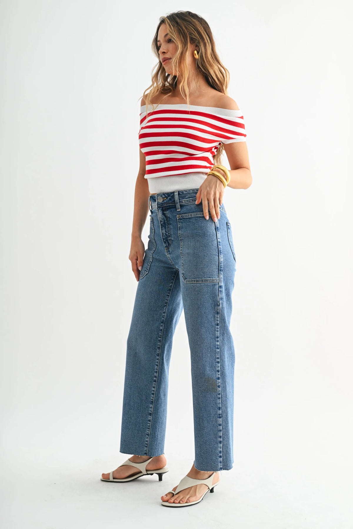 Nautical high rise wide leg denim jeans in blue with high waist, straight-leg cut, and visible stitching details