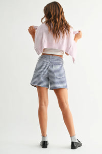 High rise gingham shorts in navy white pattern with tailored fit pockets