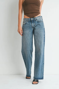High-waisted wide-leg denim jeans in medium blue wash with classic stitching and button closure low rise baggy style