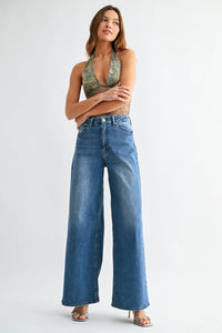 High rise full length loose straight denim jeans in medium blue wash with classic stitching and button closure