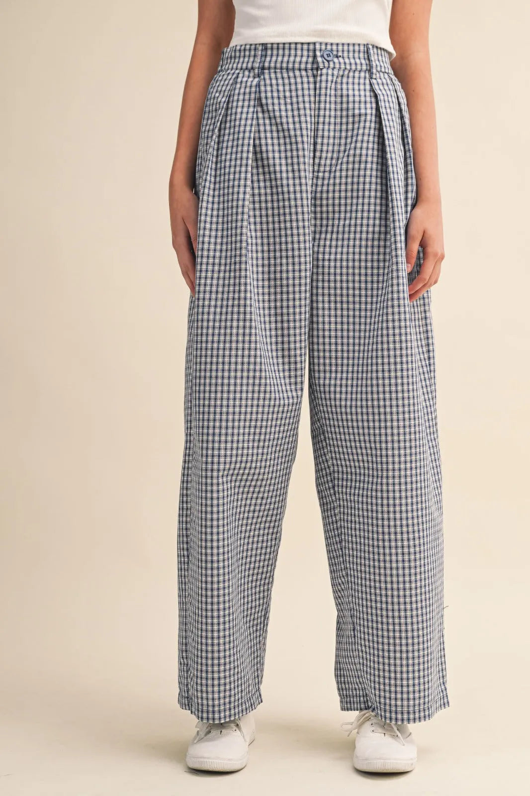 High-waisted wide-leg check pattern pintuck pants in black and white lightweight cotton with pleated waist detailing