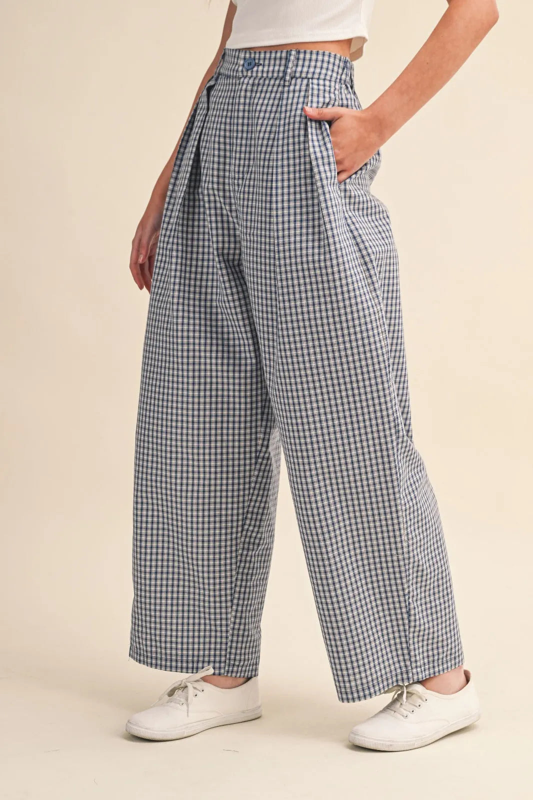 Check pattern pintuck high-waisted wide-leg trousers in navy and white gingham with pleated front pockets and relaxed fit