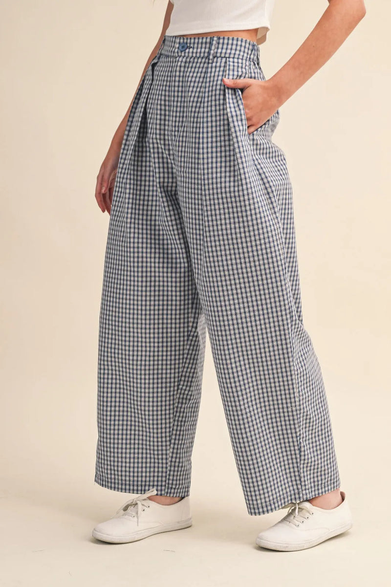 Check pattern pintuck high-waisted wide-leg trousers in navy and white gingham with pleated front pockets and relaxed fit