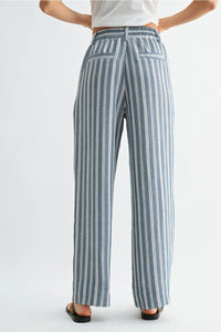 High-waisted striped wide leg drawstring pants in light blue and white vertical stripes made from lightweight fabric