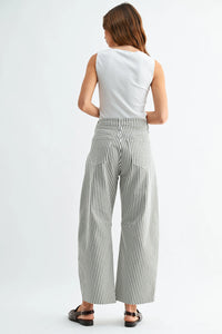 The seamed barrel wide leg denim jeans feature high-waisted black and white vertical stripe wide leg denim with pleats at back