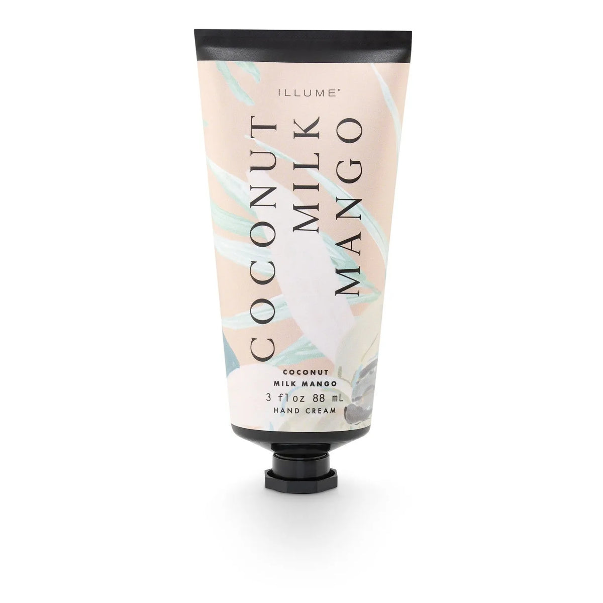 Illume coconut milk mango hand cream in a soft pink and white tube with black cap for moisturizing hands