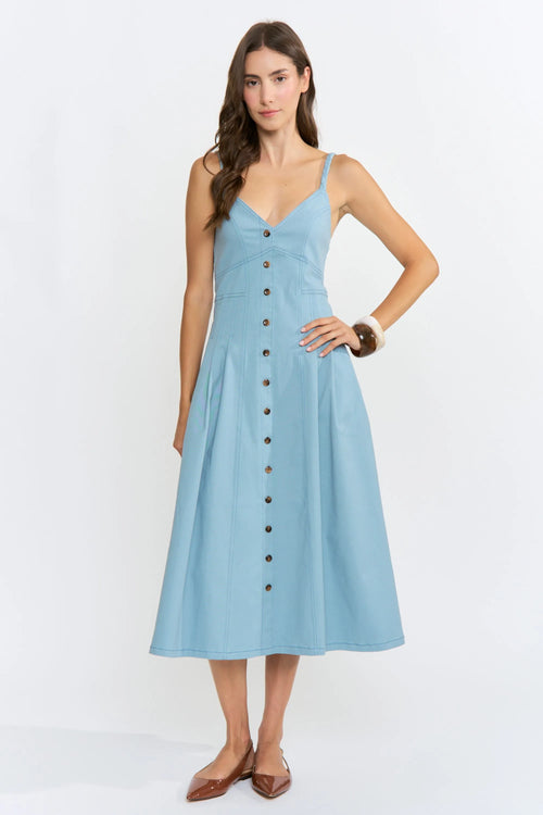 A light blue midi denim dress with thin straps and a button-front design in denim material