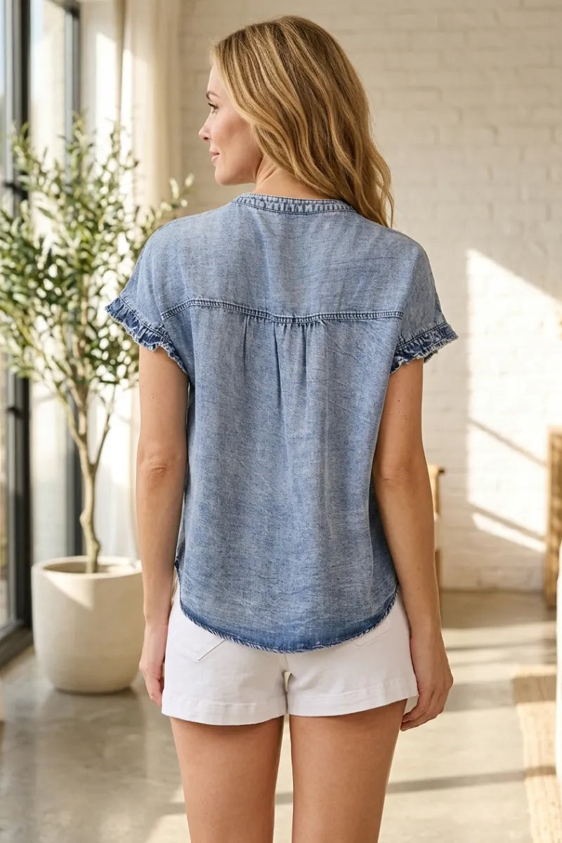 Light blue tencel short sleeve button shirt with flutter sleeves and a relaxed fit for casual wear