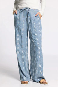Thread & Supply Natalia pants in light blue denim with white dot embroidery