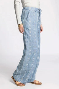 Thread & Supply Natalia pants in light blue denim with white dot embroidery
