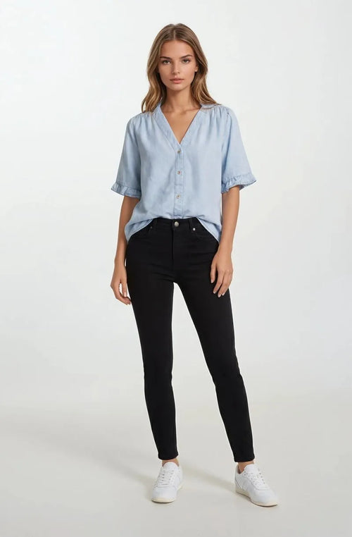 Light blue denim v-neck button down mini ruffle short sleeve top with ruffle short cuffs in soft cotton blend