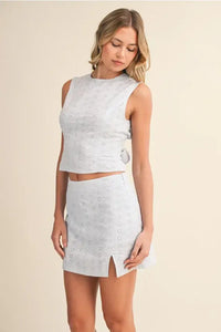 Eyelet open tie back sleeveless crop top in light blue