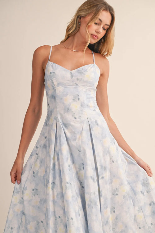 A light blue floral bustier sleeveless flare midi dress with delicate straps and a fitted bodice in floral print