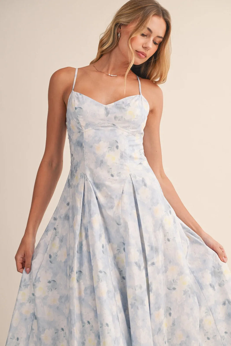 A light blue floral bustier sleeveless flare midi dress with delicate straps and a fitted bodice in floral print