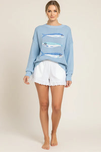 Light blue fish graphic sweater with embroidered blue fish designs