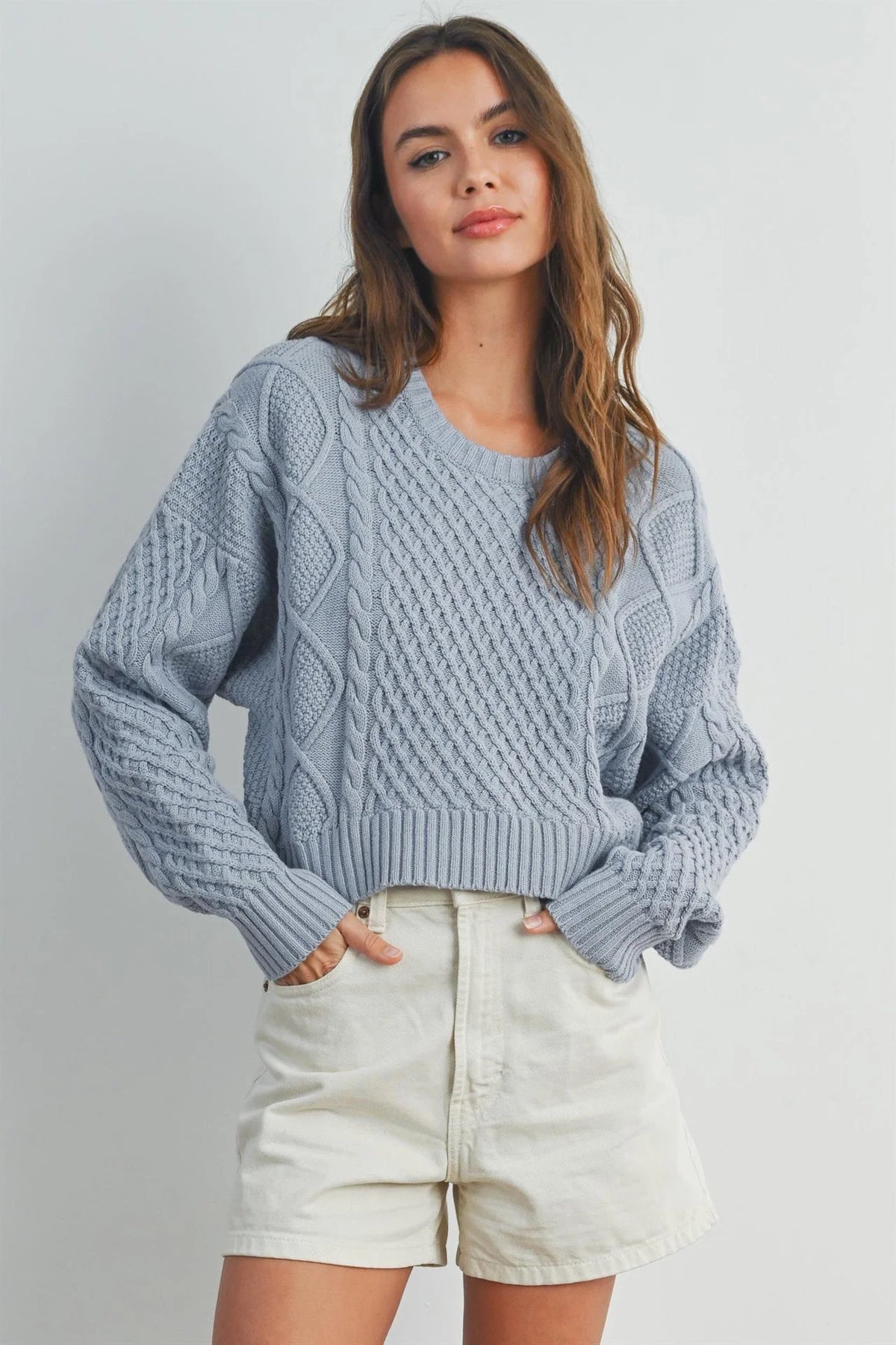 Light blue casual solid cable knit sweater with intricate patterns
