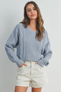 Light blue casual solid cable knit sweater with intricate patterns