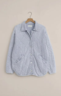 Boulder knit denim jacket in light blue quilted cotton with collar and buttons