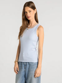 A light blue ribbed sleeveless edlin basic tank with a round neckline from Thread and Supply