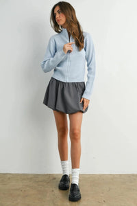 Light blue ribbed long sleeve mock neck cardigan with front zipper