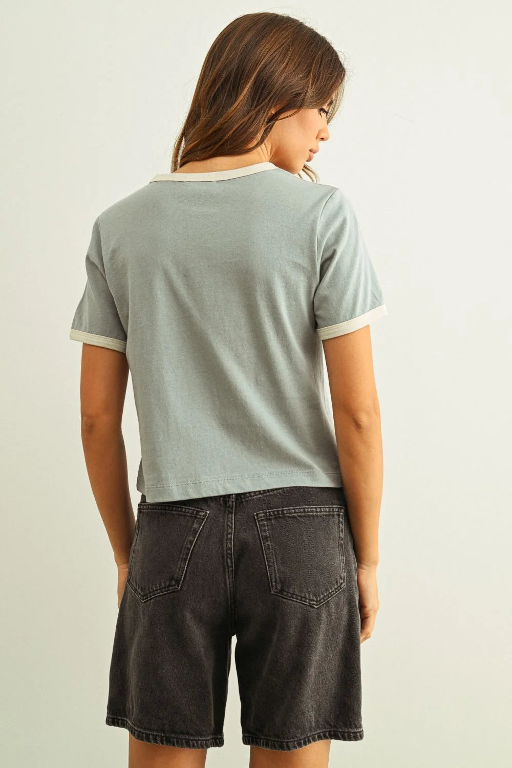 Light blue short sleeve ringer organic cotton top with white trim