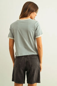Light blue short sleeve ringer organic cotton top with white trim