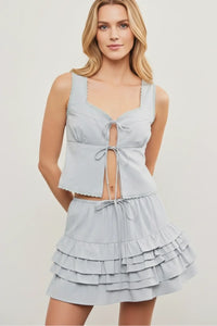 Light blue scallop trim edge sleeveless top with ruffled skirt