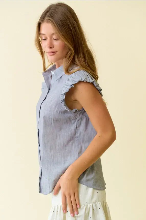 Light blue puff sleeve button down top with subtle stripes and delicate ruffled shoulder details in lightweight fabric