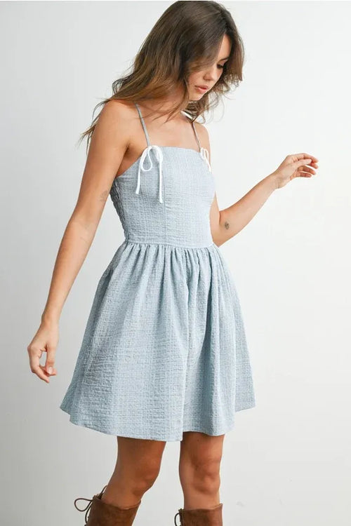 Light blue textured cotton polka dot flare mini dress with white strap fit tie straps