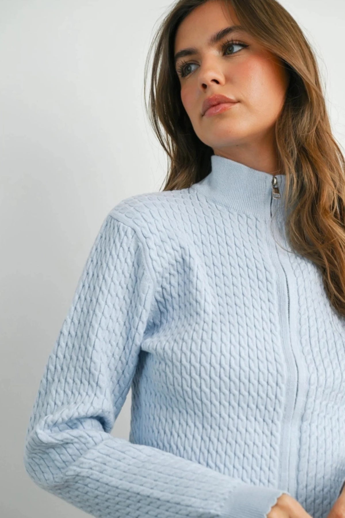 Light blue textured knit long sleeve mock neck cardigan