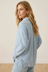 Light blue and white vertically striped loose-fitting denim knit stripe jacket for all day wear