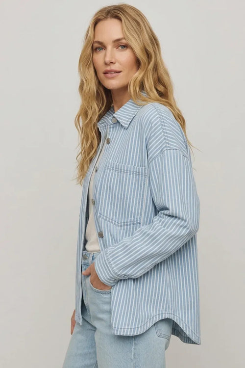 Light blue and white knit stripe jacket with button-up front chest pocket and relaxed fit in denim material