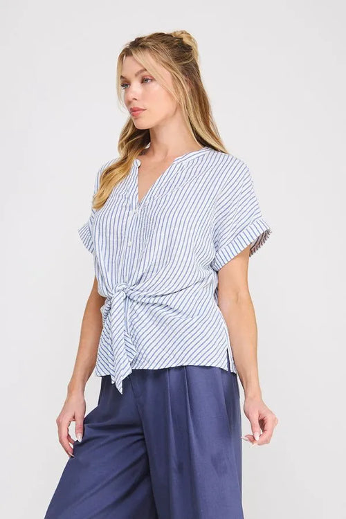 A light blue and white striped button down v neck blouse with ruffled sleeves and front tie detail for womens boho clothes