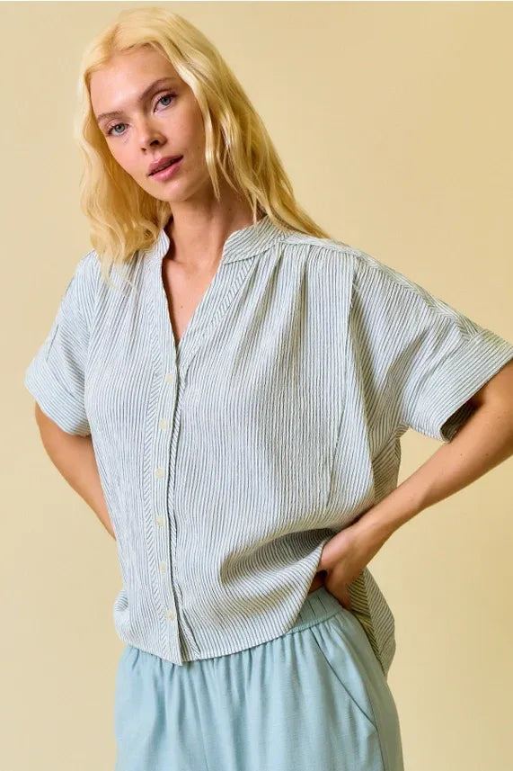 Light blue and white stripe button short-sleeved shirring raw flowy top with a relaxed oversized fit