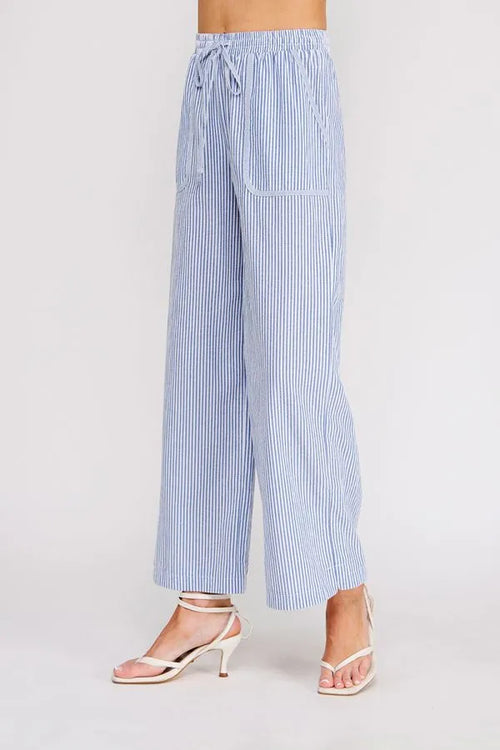 Light blue and white vertically striped wide-leg pants with a drawstring waistband in woven cotton blend fabric