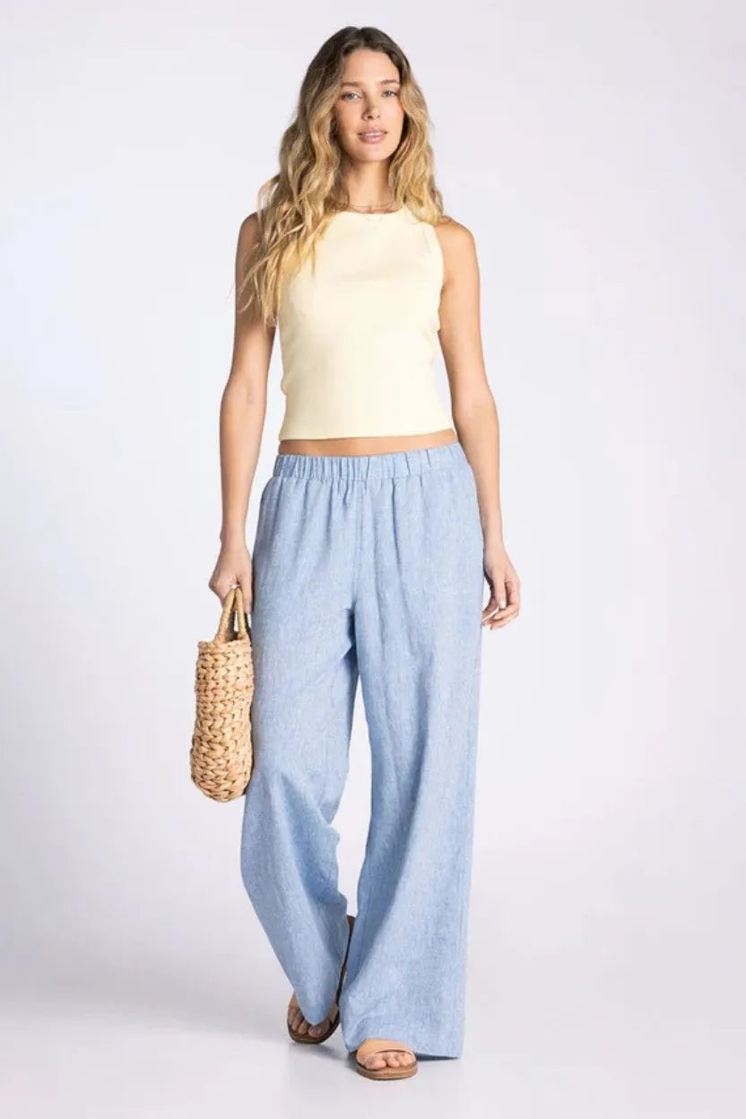 Light blue wide-leg linen pants styled with the evie basic tank for a casual and breathable look