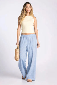 Light blue wide-leg linen pants styled with the evie basic tank for a casual and breathable look