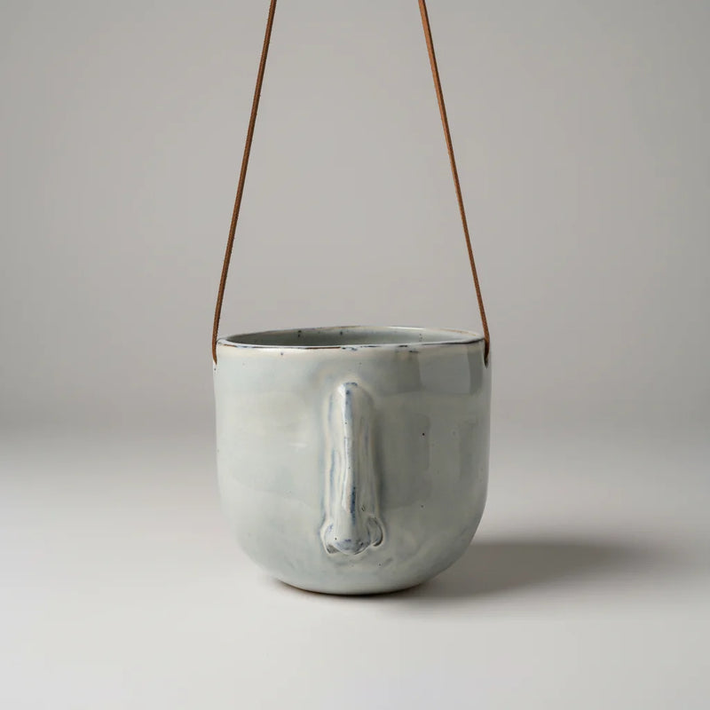 Minimalist boho white ceramic face hanging planter with leather straps
