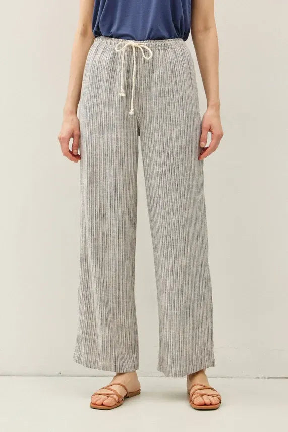 Light gray and white stripy linen wide leg pants with drawstring waistband for comfortable casual wear