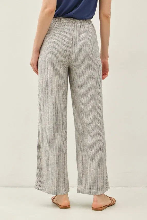 Light gray and white stripy linen wide leg pants with elastic waistband perfect for casual wear