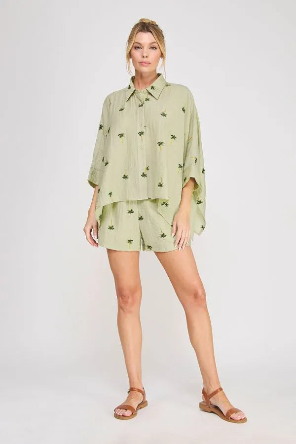 Light green palm tree crinkled woven button-up shirt with subtle palm tree print for casual wear