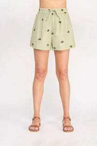 Light green palm tree crinkled woven shorts with subtle palm tree print and elastic waistband for casual wear