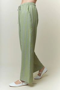 Light green and white yarn dye stripe elastic pants with wide-leg cut and drawstring waistband for casual wear