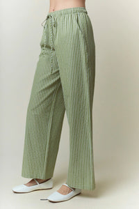 Light green and white yarn dye stripe elastic pants with wide-leg design and drawstring waistband for comfortable wear