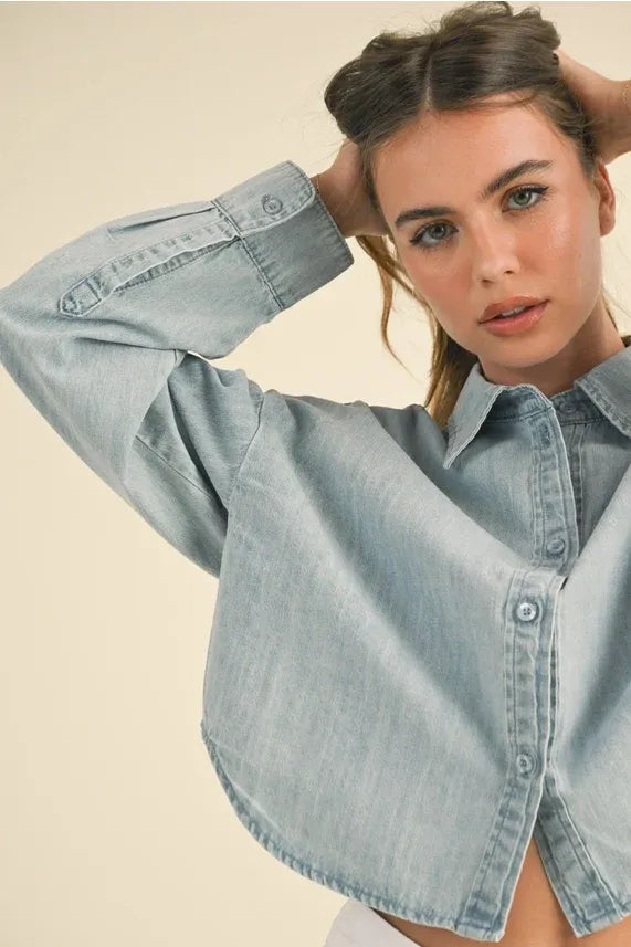 Light-wash denim shirt with a relaxed cropped fit and classic collar in a short body denim style body denim shirt