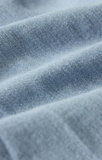 Light-wash denim fabric with soft faded blue hue and woven texture for angel eyes chambray midi dress