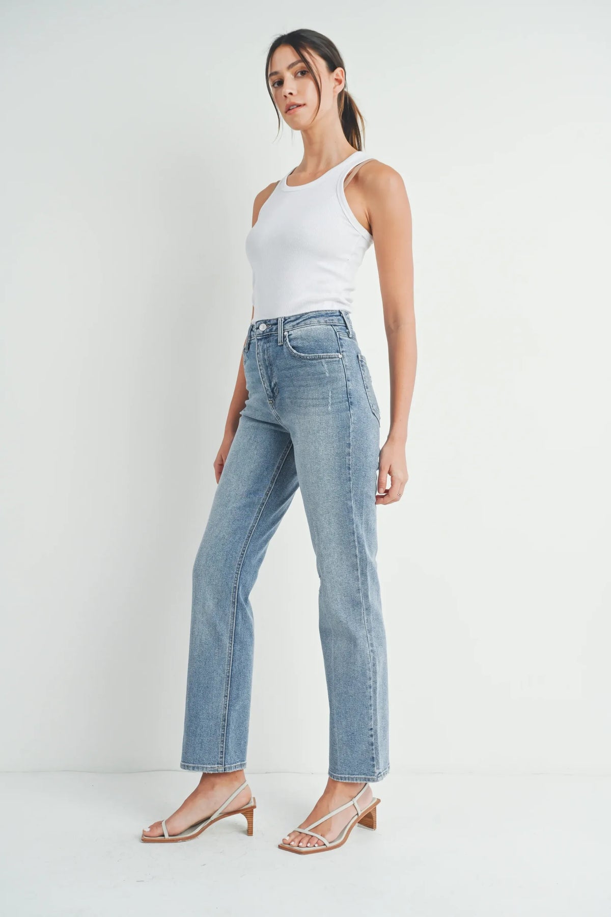 Light-wash denim high-waist full length straight denim jean with a straight-leg fit in length straight style
