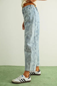 Light-wash pattern barrel denim pants featuring a subtle checker board pattern and relaxed wide-leg cut