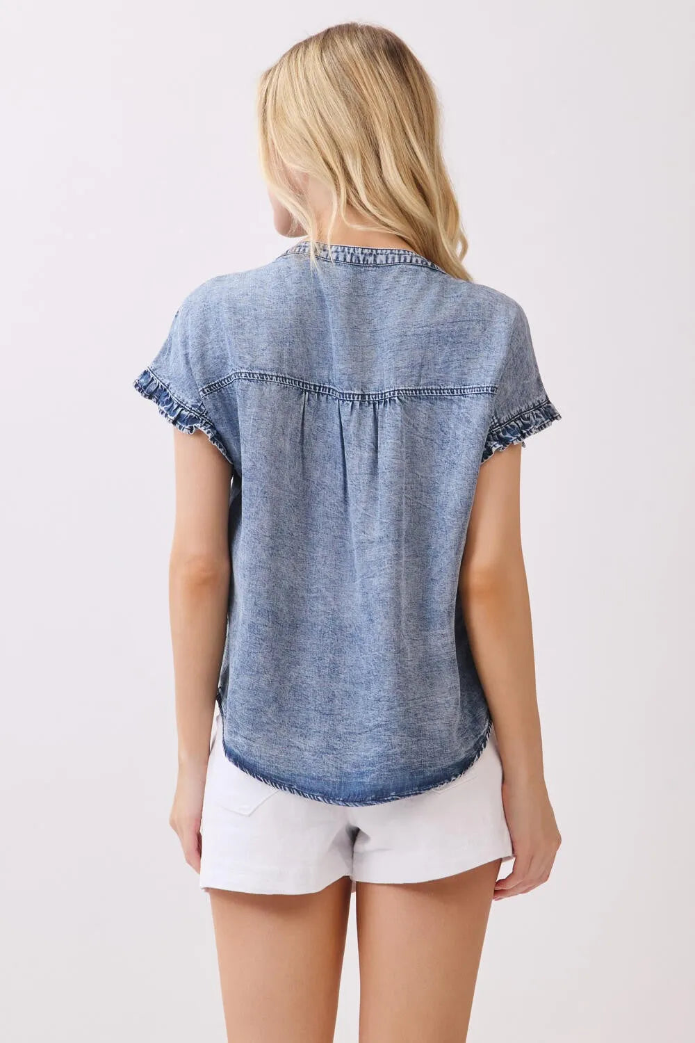 Light-wash denim tencel short sleeve button shirt with short flutter sleeves and a relaxed fit